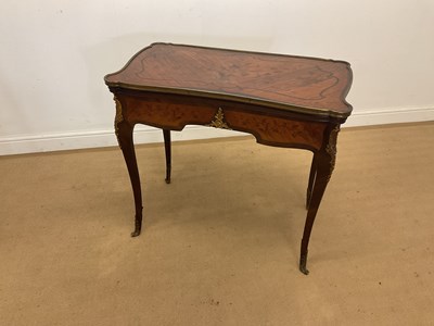 Lot 423 - A mahogany inlaid card table, with gilded...