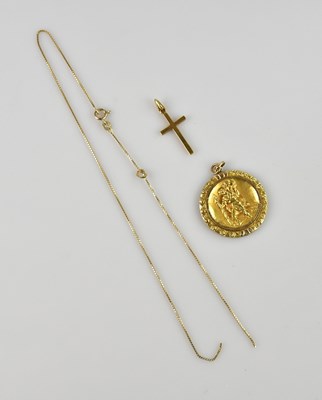 Lot 2131 - A 9ct yellow gold crucifix pendant, suspended...