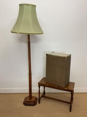 Lot 387 - An oak Art Deco standard lamp with stepped...