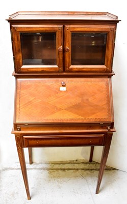 Lot 23 - A reproduction mahogany bureau, the upper...