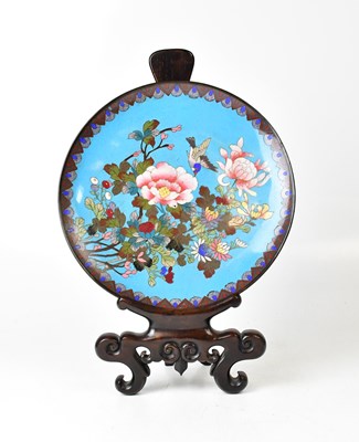 Lot 399 - A cloisonné charger of blue ground depicting a...