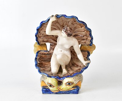 Lot 212 - A Majolica porcelain model of a nude lady,...