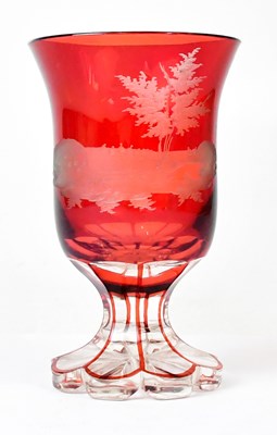Lot 427 - A 19th century Bohemian ruby glass vase etched...