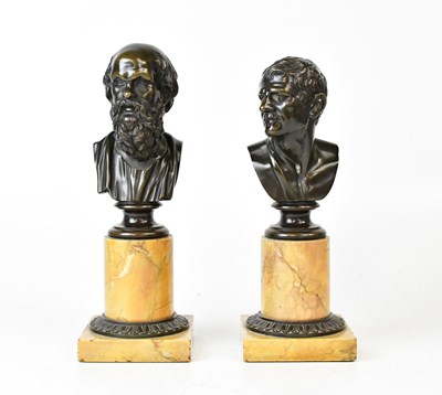 Lot 411 - A pair of Grand Tour bronze busts after...