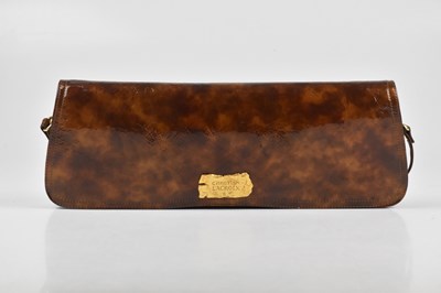 Lot 352 - CHRISTIAN LACROIX, ITALY; a patent brown...