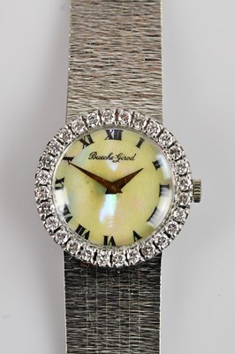 Lot 454 - BUECHE-GIROD; a lady's white metal wristwatch,...