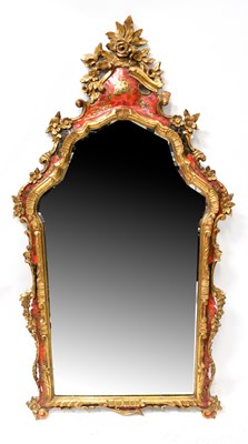 Lot 103 - A gilt-heightened red and black lacquered...
