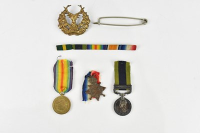 Lot 1242 - A group of three medals comprising a Victory...