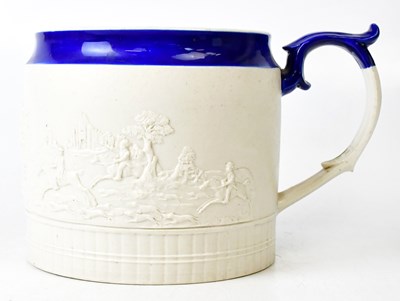 Lot 242 - A 19th century stoneware mug, relief moulded...
