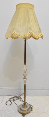 Lot 1825 - An onyx and brass standard lamp, height 167cm.