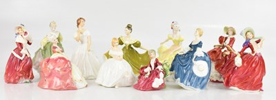 Lot 1638 - ROYAL DOULTON; a collection of eleven figures...
