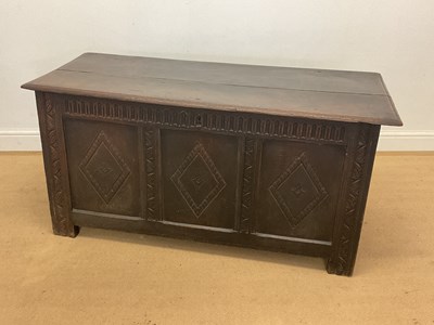 Lot 402 - An 18th century oak coffer with diamond...