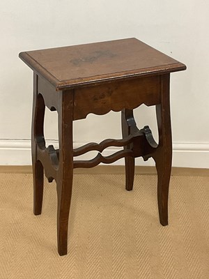 Lot 430 - An oak stool with a decorative stretcher,...