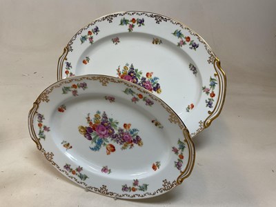 Lot 242 - NORITAKE; a floral decorated gilt heightened...