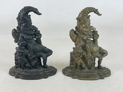 Lot 108 - A pair of Mr Punch doorstops, one cast iron...