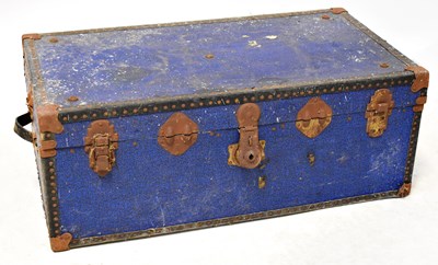 Lot 93 - Two vintage tin trunks, one covered in blue...