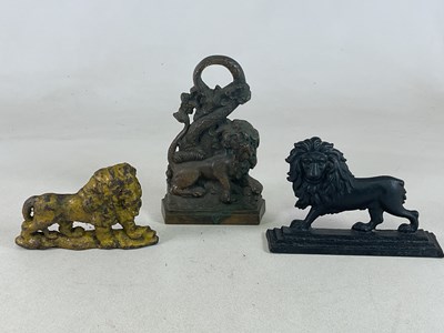 Lot 118 - Three 19th century cast iron doorstops, one...