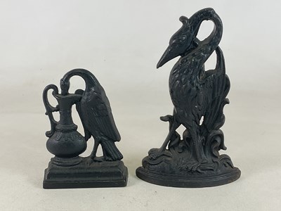 Lot 119 - Two 19th century cast iron doorstops, a heron,...