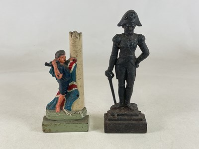 Lot 109 - Two 19th century cast iron doorstops, Lord...