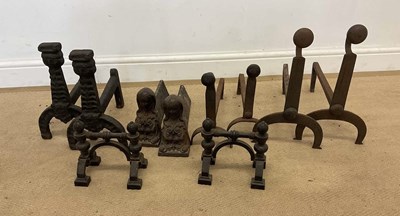 Lot 110 - Five pairs of fire dogs, including an Egyptian...