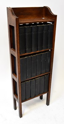 Lot 620 - An early 20th century set of oak shelves...