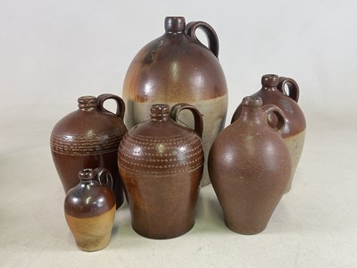 Lot 196 - Six various salt glazed flagons, largest...