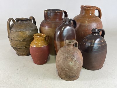 Lot 192 - Seven stoneware and salt glazed flagons, pots...