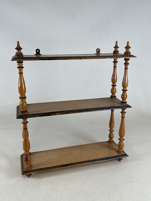 Lot 435 - A set of pine wall shelves, with black painted...