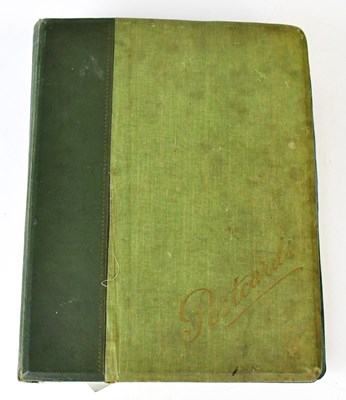 Lot 649 - A postcard and photograph album dating from...