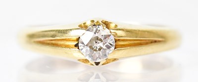 Lot 793 - An 18ct yellow gold ring set with solitaire...