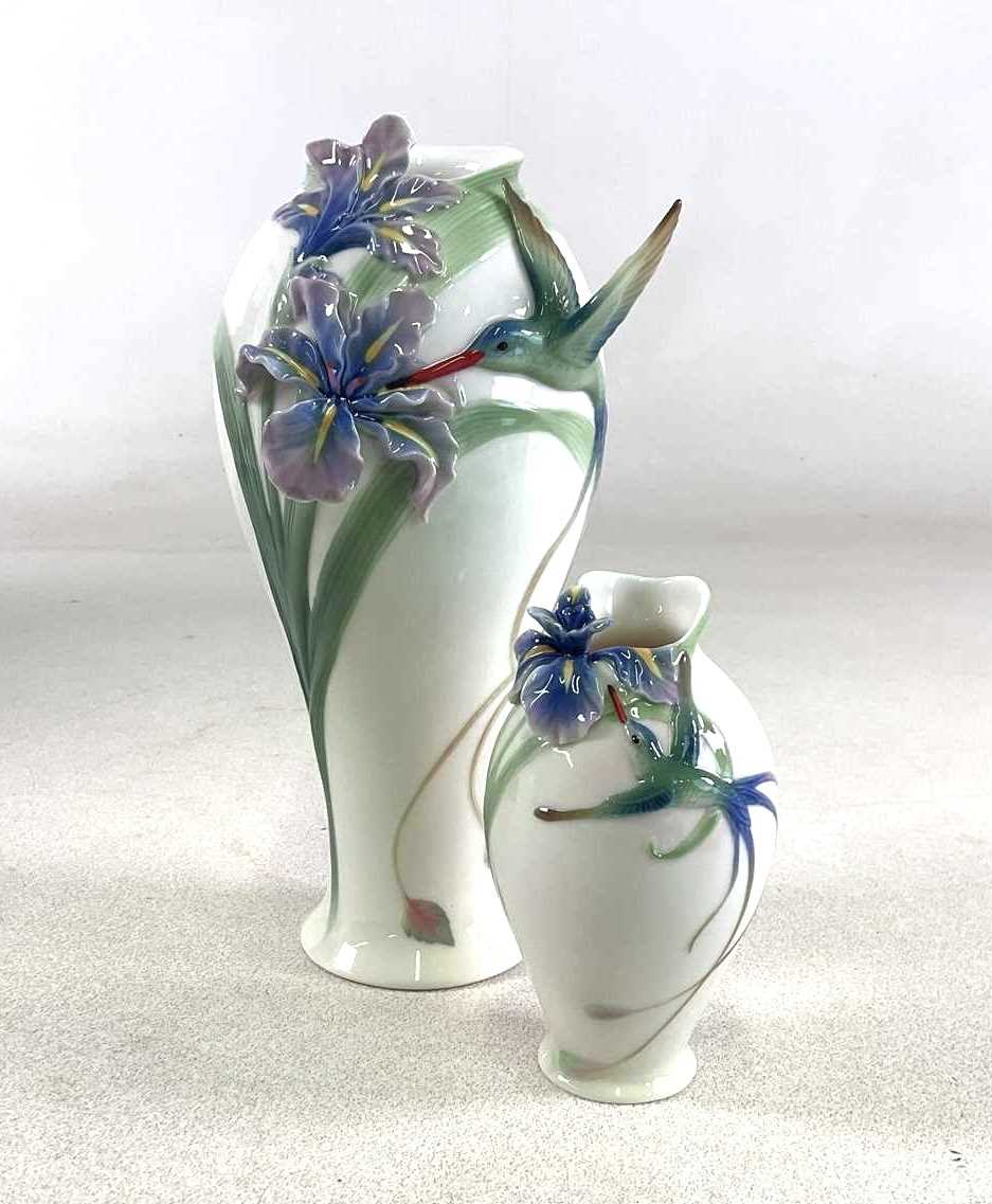 Lot 190 - FRANZ PORCELAIN; two hummingbird vases, taller...