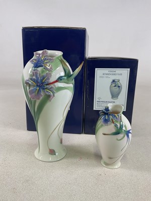Lot 190 - FRANZ PORCELAIN; two hummingbird vases, taller...