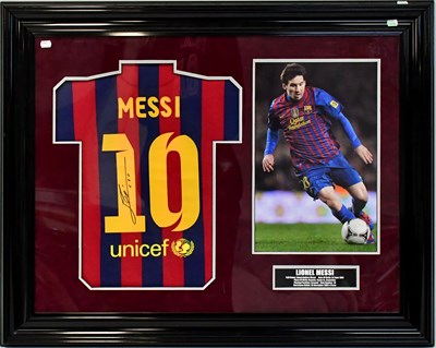 Lot 554 - FC BARCELONA; a home jersey, bearing Lionel...