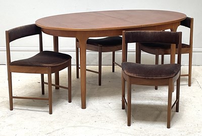 Lot 9 - A mid century teak oval extending dining table,...