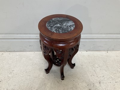 Lot 1541 - A reproduction Chinese jardinière stand with...