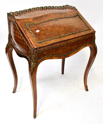Lot 32 - A Louis XV style marquetry inlaid kingwood and...