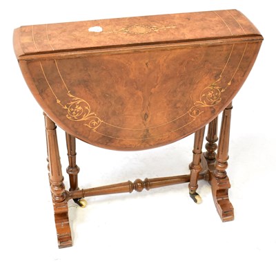 Lot 69 - A Victorian inlaid walnut Sutherland table on...
