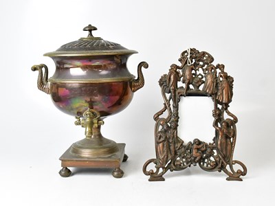 Lot 538 - A copper tea urn with brass fittings, and a...