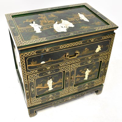 Lot 398 - An Oriental lacquered green chest, comprising...