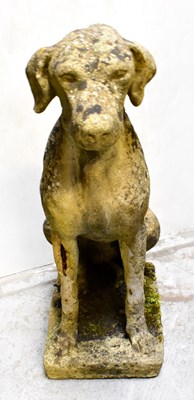 Lot 108 - A reconstituted stone statue of a seated dog,...
