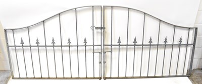 Lot 111 - A pair of galvanised gates with shaped upper...
