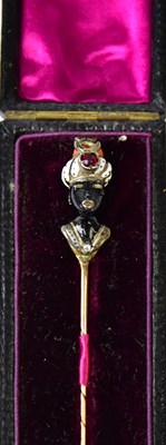 Lot 844 - A Victorian Blackamoor tie pin in the style of...