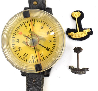 Lot 548 - A German WWII Luftwaffe pilot's wrist compass,...