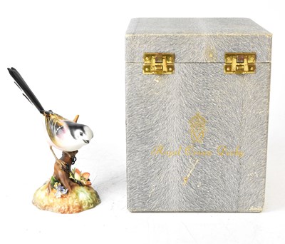 Lot 223 - ROYAL CROWN DERBY; a matte glazed figure 'Long-...