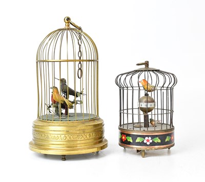 Lot 532 - A reproduction automaton birdcage clock and a...