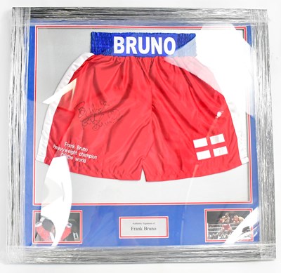 Lot 565 - FRANK BRUNO; a signed pair of shorts mounted...