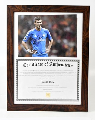 Lot 543 - GARETH BALE; a signed photograph of the player...