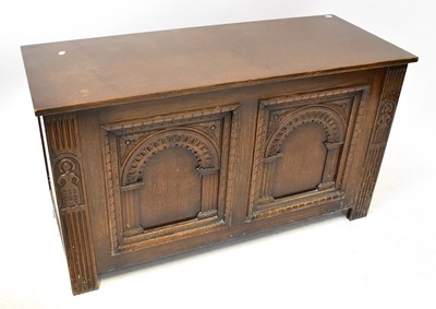 Lot 29 - A Georgian-style oak coffer with fielded and...