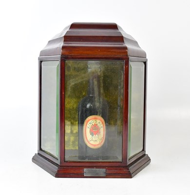 Lot 208 - A mahogany glazed display case with canted...