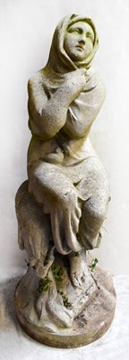 Lot 109 - A reconstituted statue of a seated female...